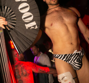 A 'woof' echoes amidst the electric buzz of White Party Palm Springs.